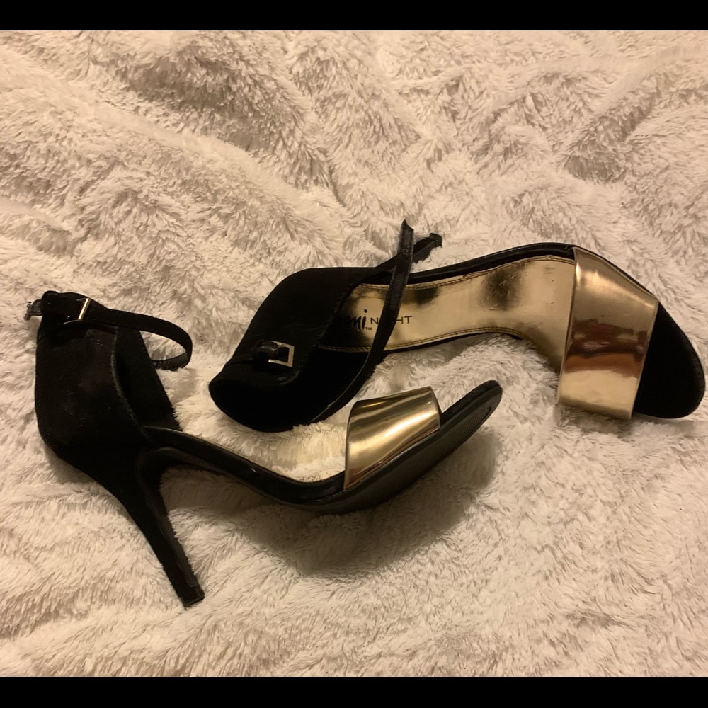 Black and gold heels